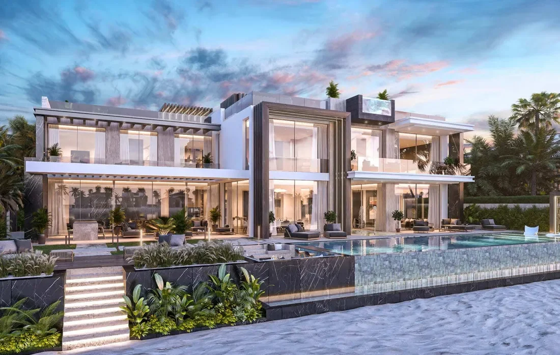 Ultra-luxury Dubai waterfront villa with infinity pool at sunset, palm trees and Arabian Gulf views, illustrating the top end of the Dubai residential market